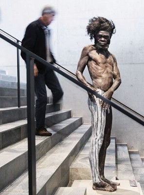 Figure 3. One of the seven life-size mannequins of early hominins on the museum’s central staircase (photograph by JaCob Due, Photo/Media Department, Moesgaard).